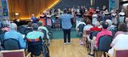 Tom conducting the Community Choir Summer Concert