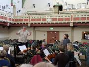 Tom Newall conducting the rehearsal with Samual Jackson