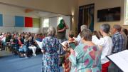 3. Tom conducting One Short Day with wig