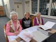 Welcoming team registering participants and giving out the music